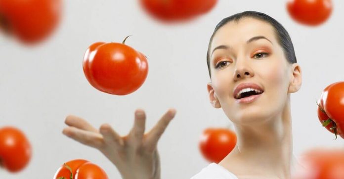 Tomato on face for clear skin